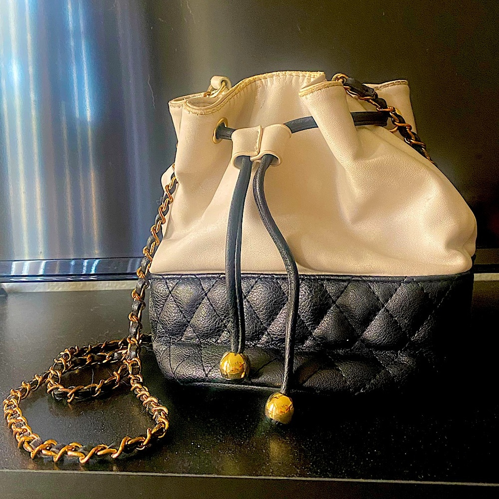 Round, medium sized cute shoulder bag purse
